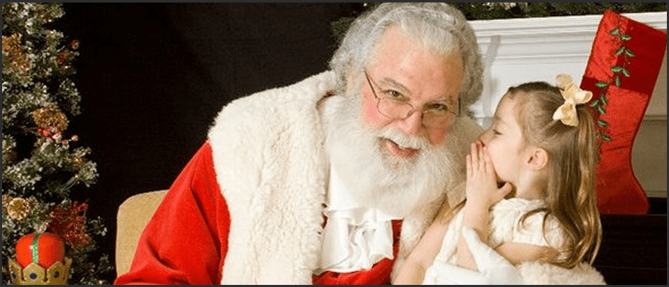 Child Whispering to Santa